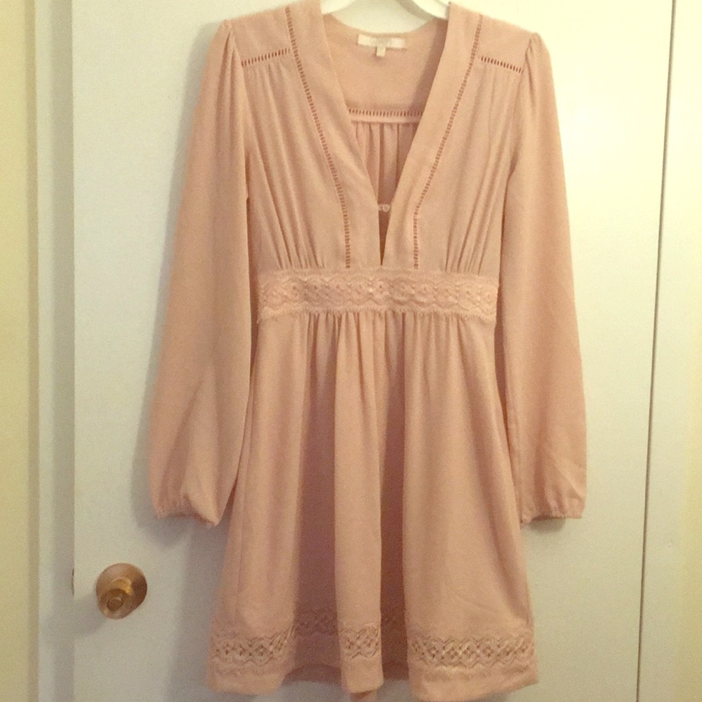 Like new long sleeved dress with flare.
